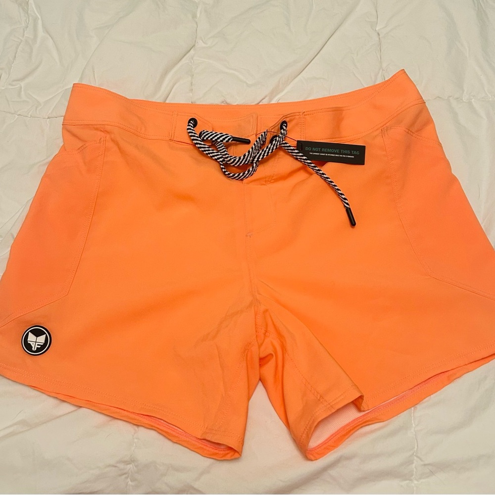 Alpha forward short swim shorts. Brand new with tags.